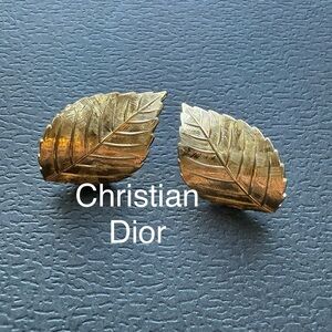 Vintage Cristian Dior gold tone leaf pierced earrings.